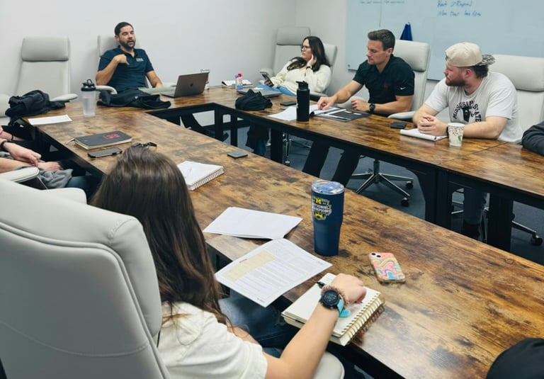 Meeting with employees in a conference room